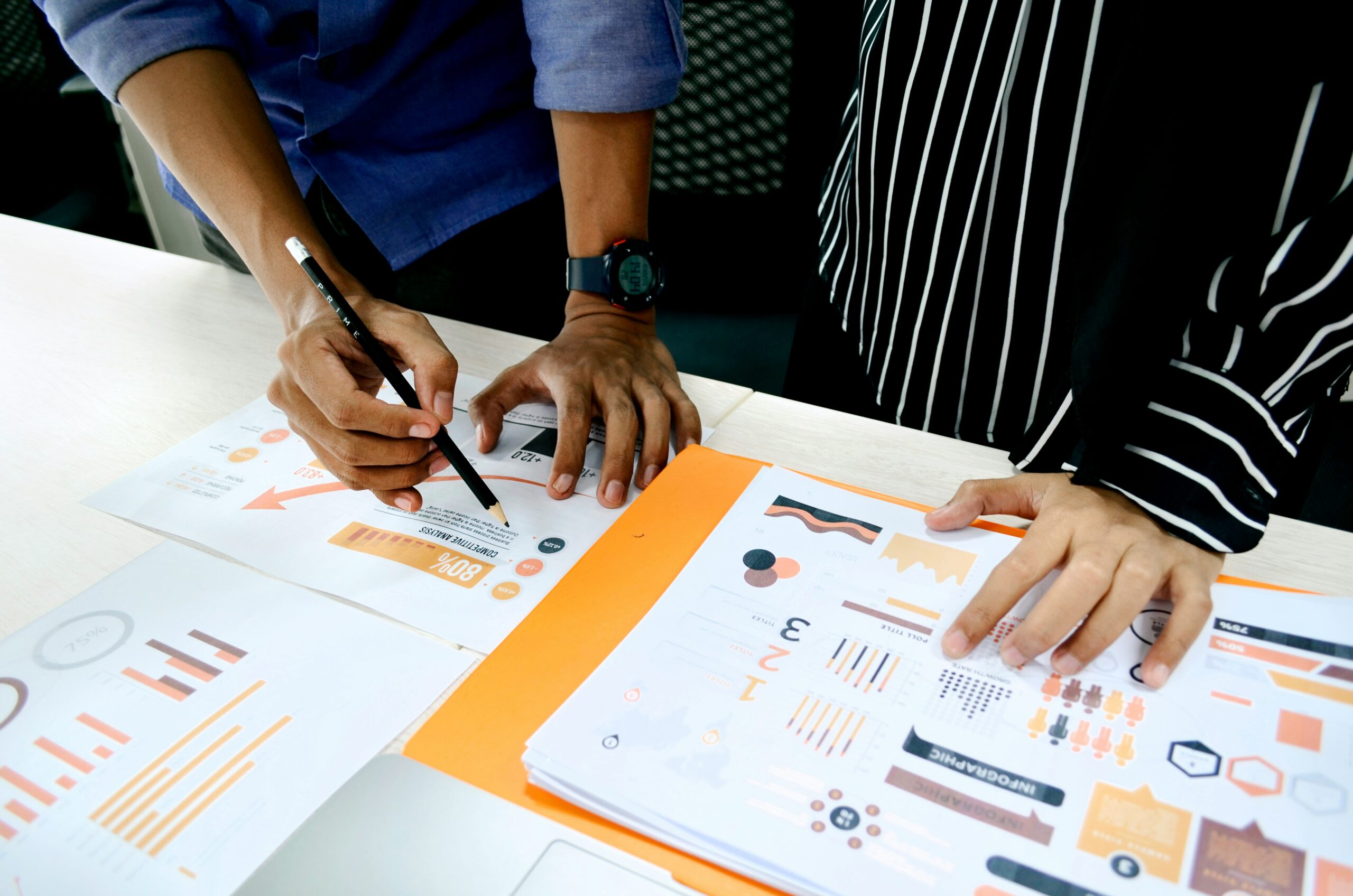 Two people analysing data
